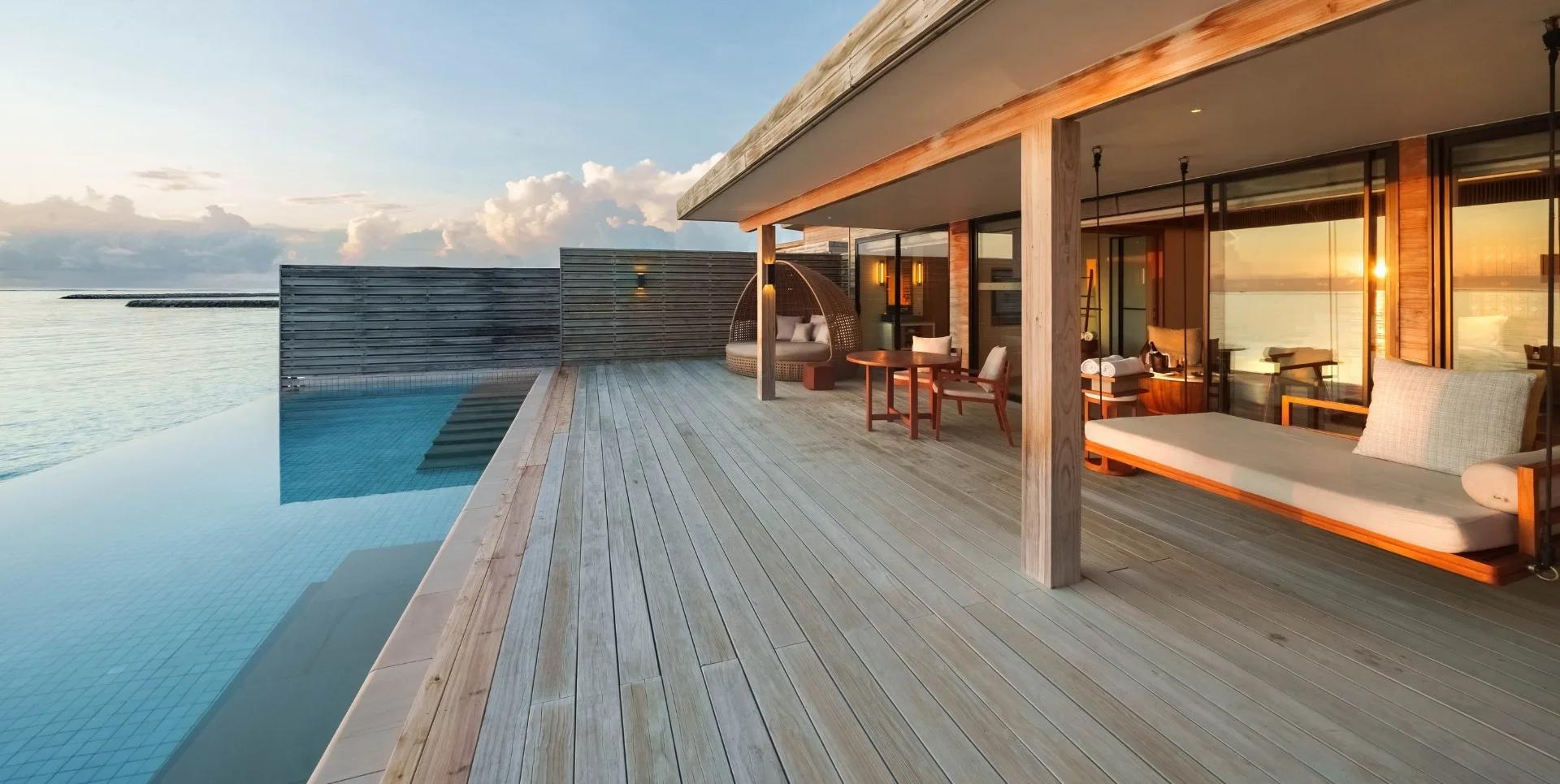 A Sunrise Water Villa's private pool and deck over the lagoon