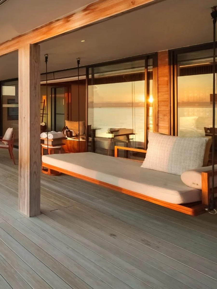 A Sunrise Water Villa's private pool and deck over the lagoon
