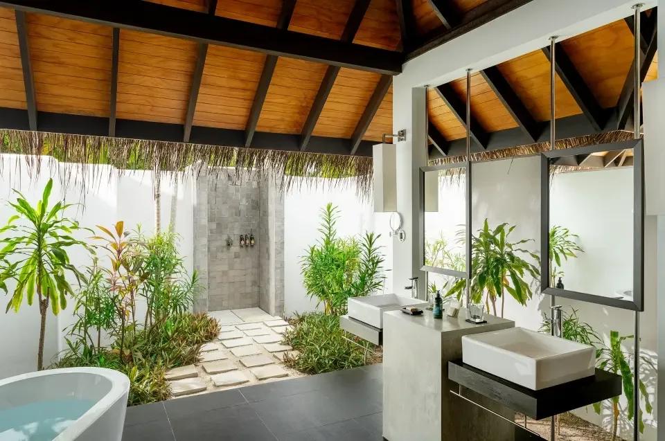Beach Villa with Pool's open-air garden shower, screened by tropical planting