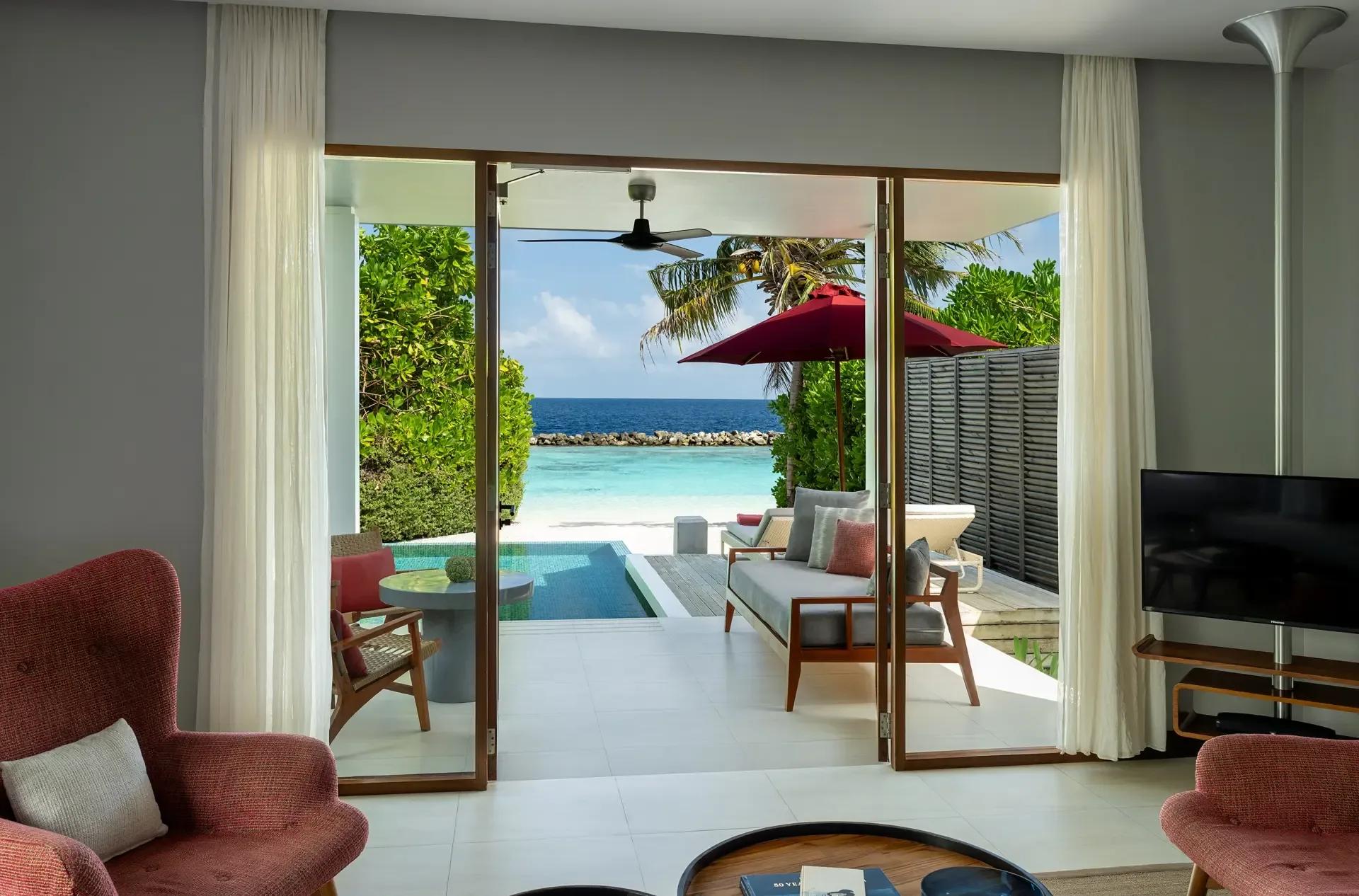 The bedroom and window seat of a Beach Suite with Pool — the closest published photograph, since Beach Suite with Garden Pool has no dedicated image in the resort's materials