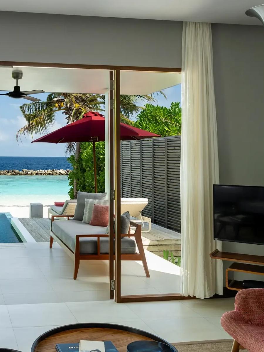 The bedroom and window seat of a Beach Suite with Pool — the closest published photograph, since Beach Suite with Garden Pool has no dedicated image in the resort's materials