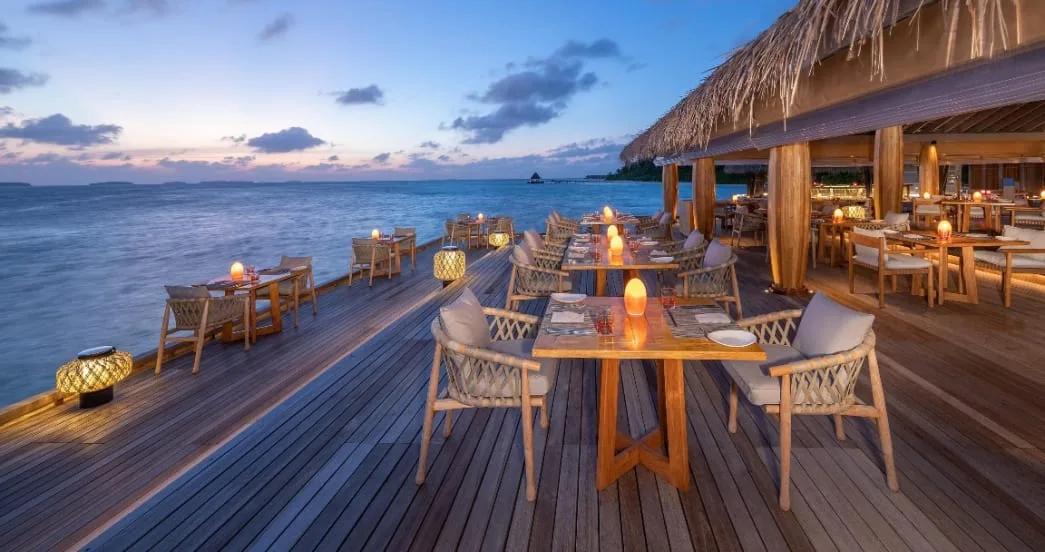 The overwater deck at SPICE restaurant, Anantara Kihavah Maldives Villas