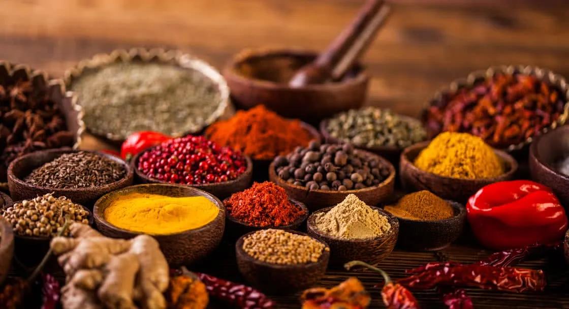 Close-up of ingredients and spices prepared for a Spice Spoons cooking class