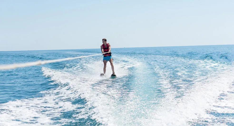 A guest waterskiing off the resort's watersports centre