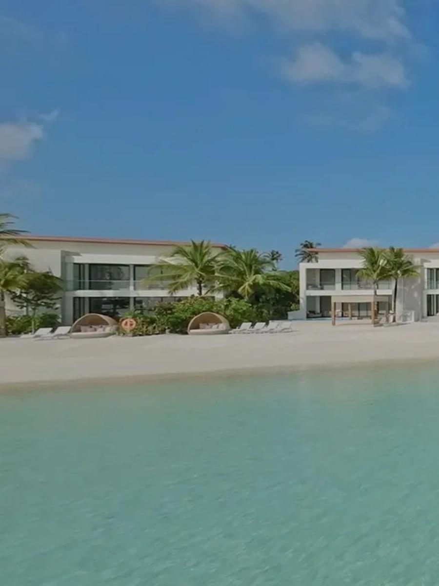 The exterior and private pool of a Three Bedroom Beach Residence at Kuda Villingili