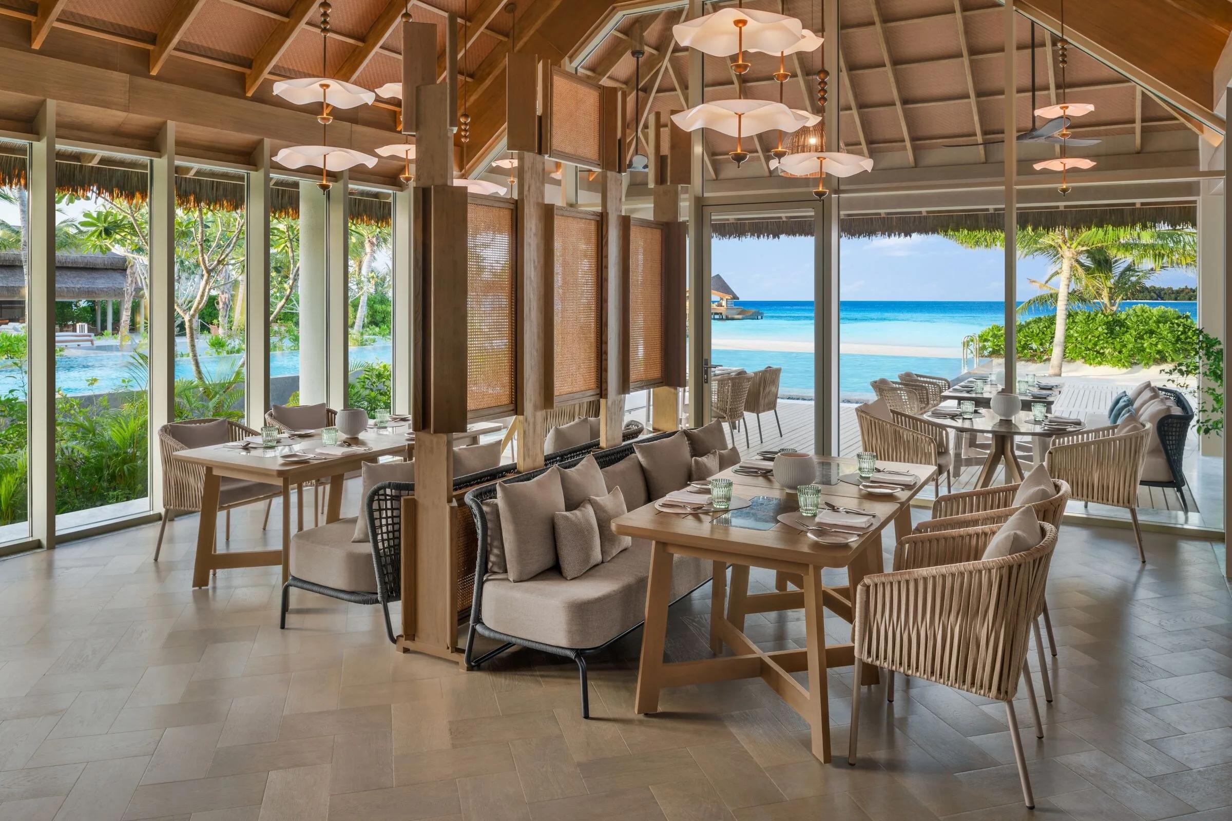Riva's oceanfront dining room, seating arranged toward the water