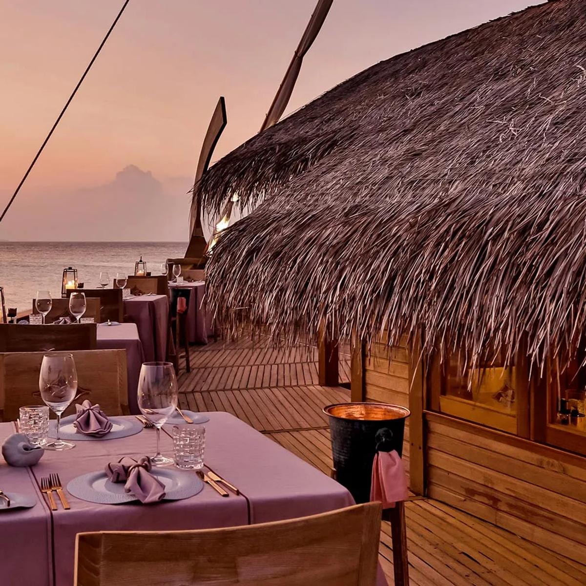 Ba'theli by the Reef, Milaidhoo's overwater restaurant built to resemble three traditional cargo boats.