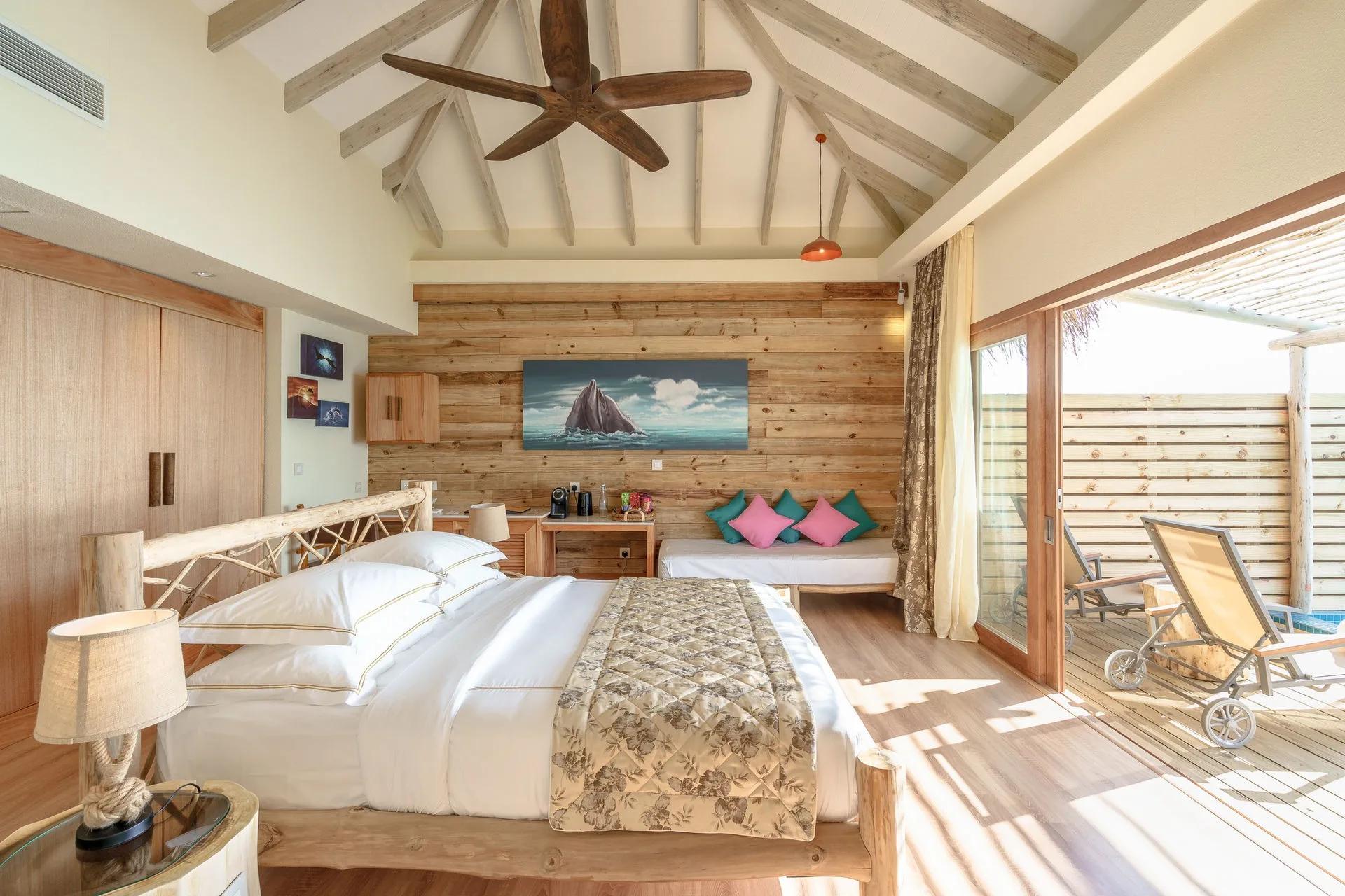 A Lagoon Suite with Pool at You & Me Maldives, an overwater suite with its own plunge pool