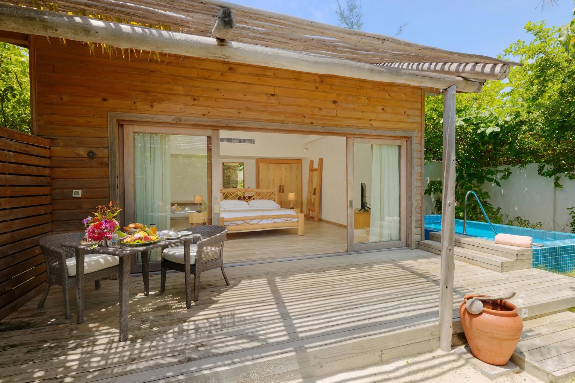 A Beach Suite with Pool at You & Me Maldives, a beachfront villa with a private pool and garden terrace
