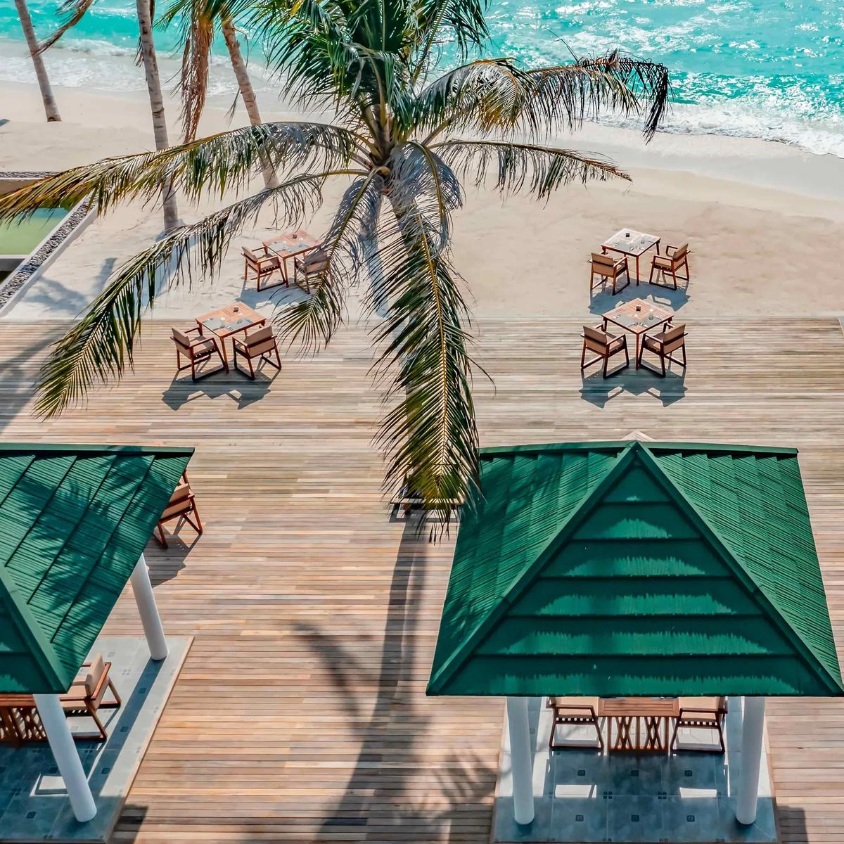 The Wahoo Grill's beachfront dining room at Siyam World