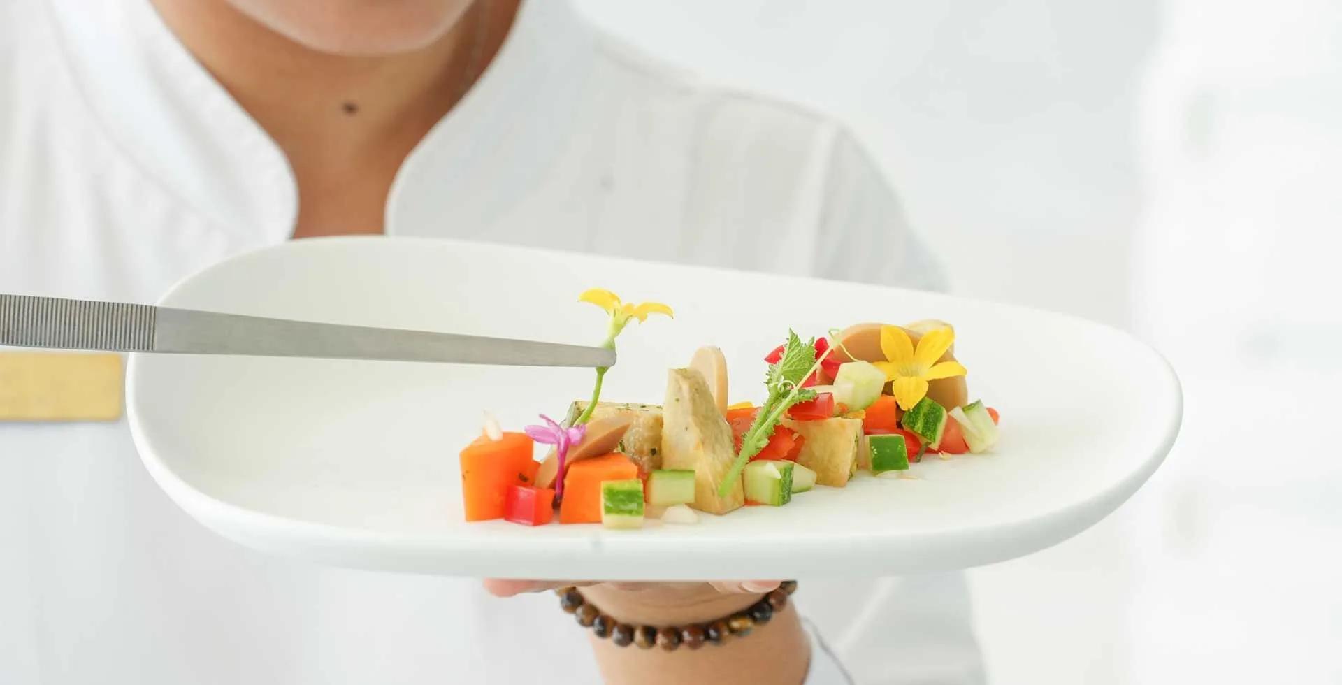 A food and beverage scene at Ifuru Island Maldives — no dedicated photograph of Palm Grill was published, so this general dining image stands in
