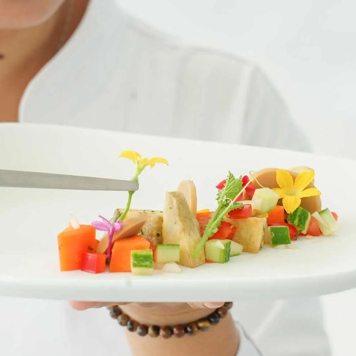 A food and beverage scene at Ifuru Island Maldives — no dedicated photograph of Palm Grill was published, so this general dining image stands in