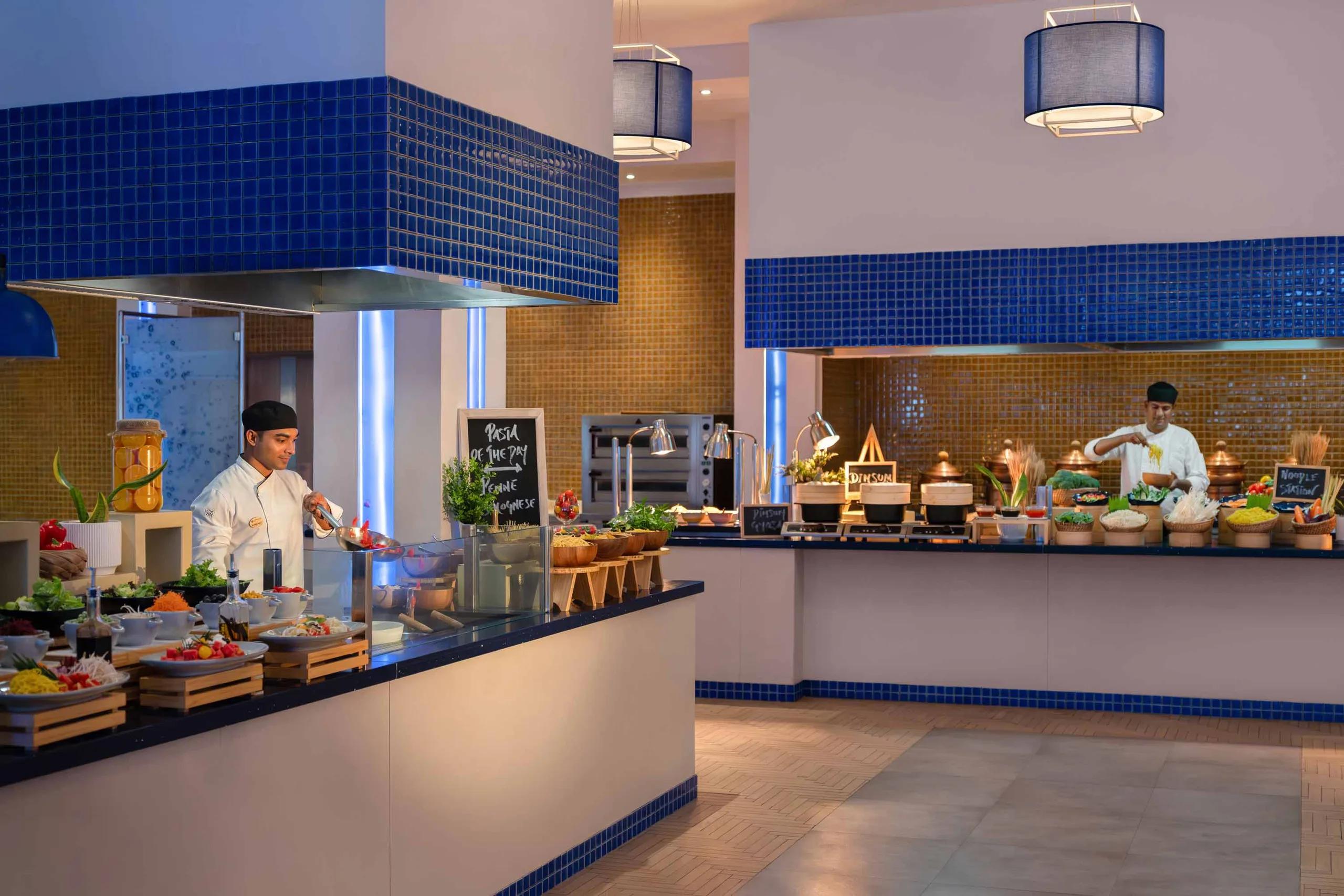 Aqua Restaurant's dining room, tables set for an international buffet service