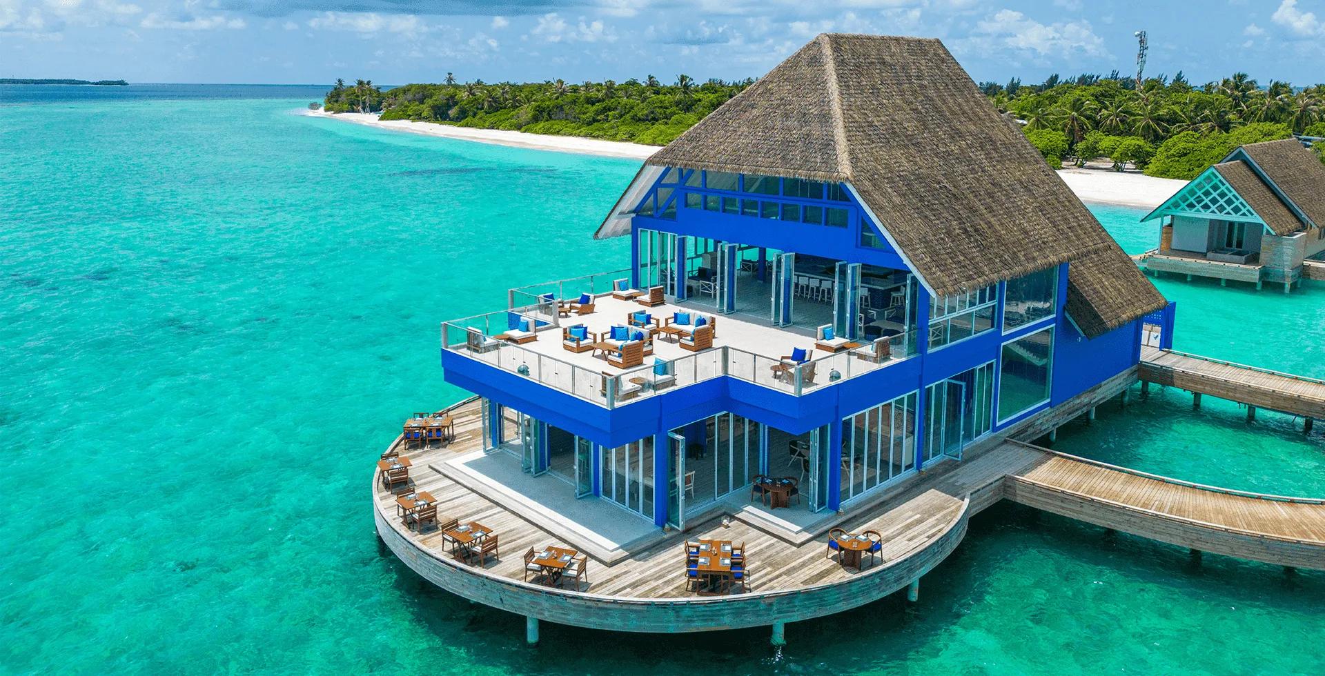 The Waterfront's dining terrace at Ifuru Island Maldives, seen from outside