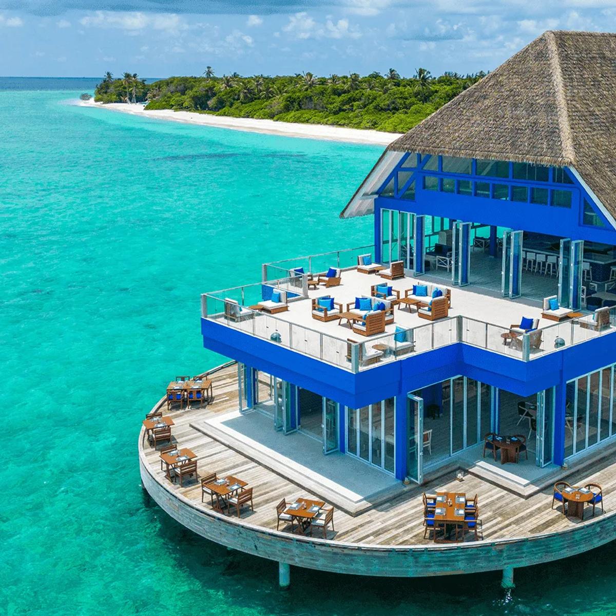 The Waterfront's dining terrace at Ifuru Island Maldives, seen from outside