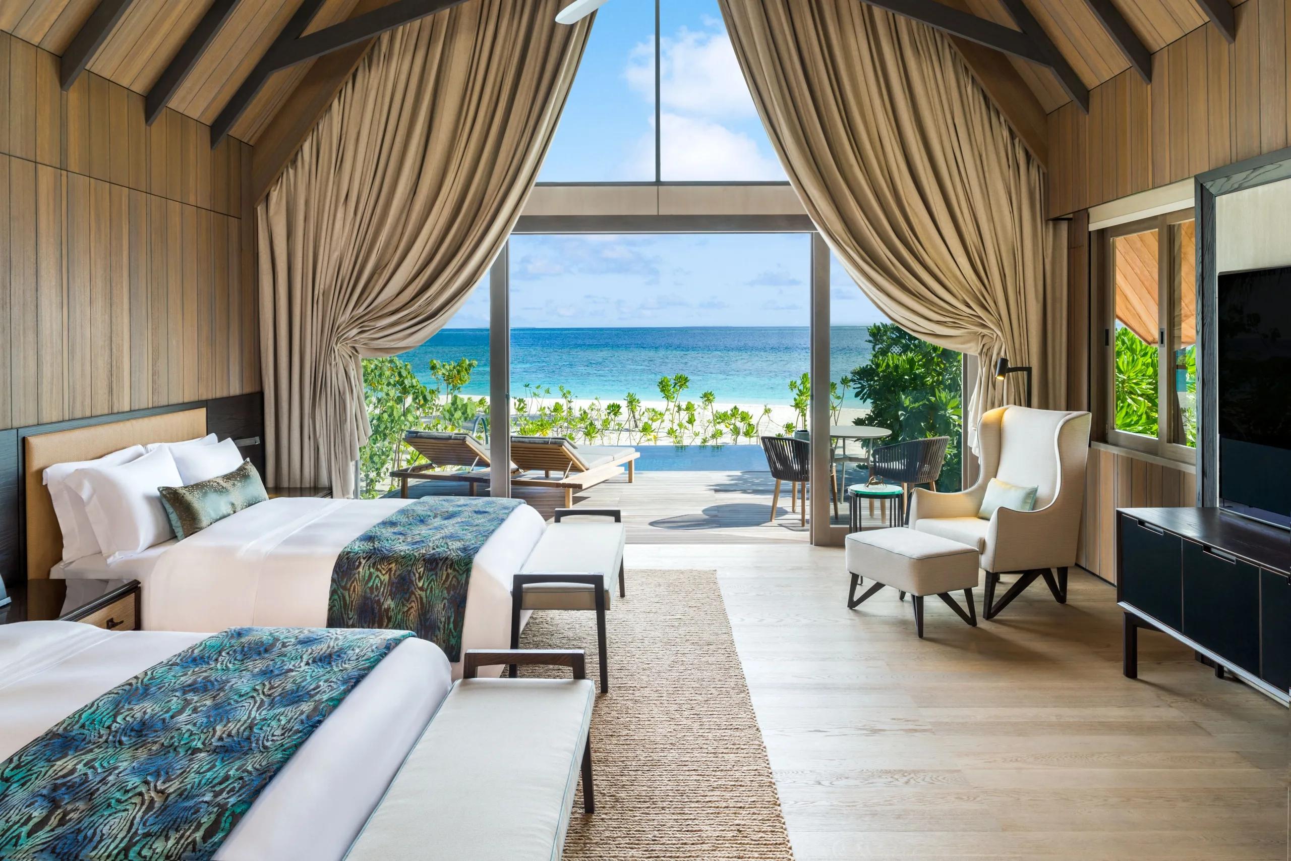 A bedroom interior at a two-bedroom beachfront signature villa at The St. Regis Maldives Vommuli Resort — the Cesar Balsa Villa shares this signature-villa footprint; a dedicated photograph is not yet available