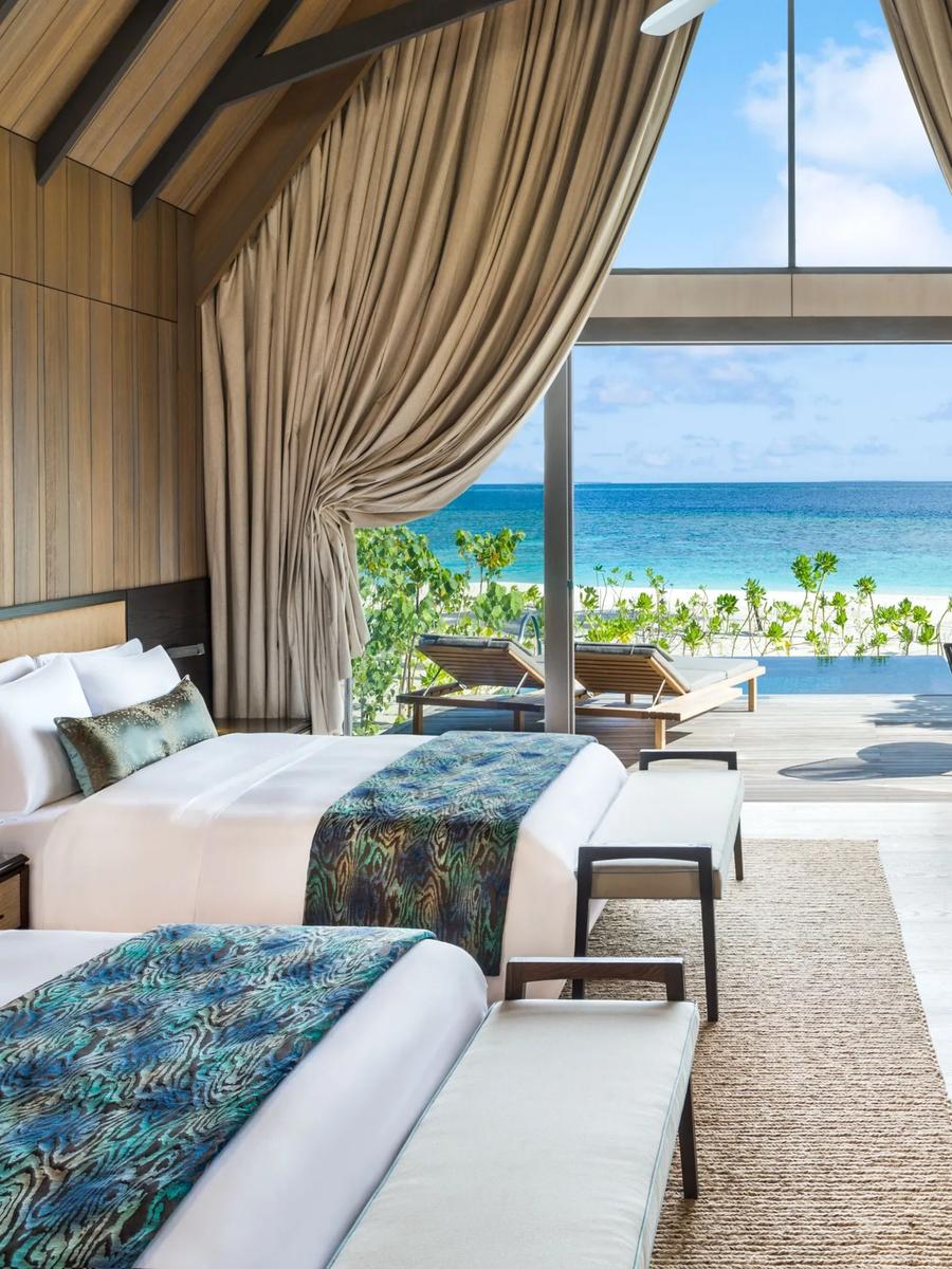 A bedroom interior at a two-bedroom beachfront signature villa at The St. Regis Maldives Vommuli Resort — the Cesar Balsa Villa shares this signature-villa footprint; a dedicated photograph is not yet available