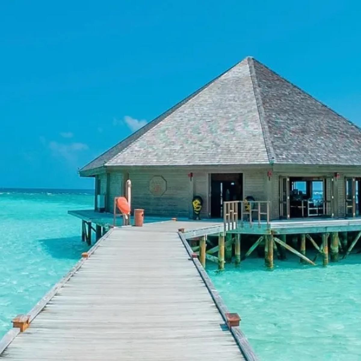 Asian Wok Restaurant's overwater pavilion at the end of a jetty over the lagoon