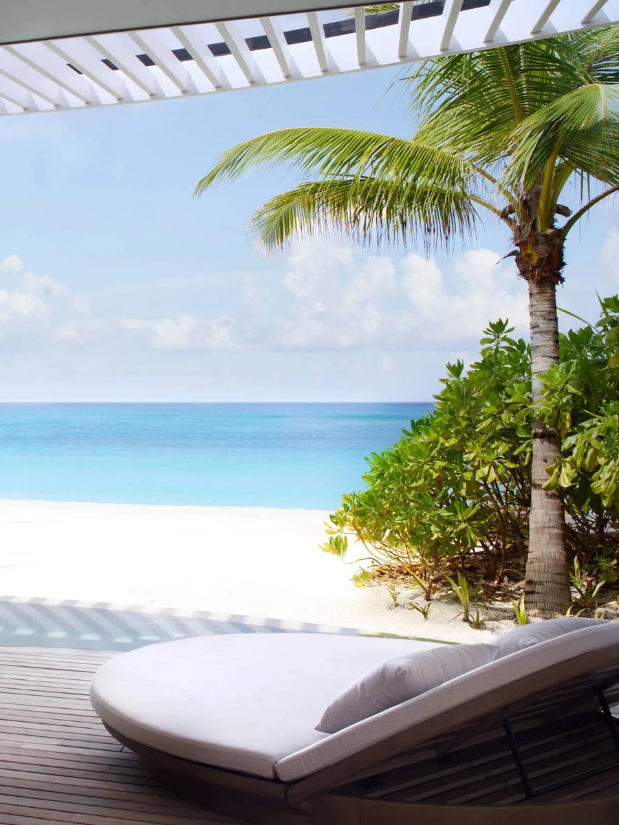 A villa's pool deck opening onto the beach — stands in for the Sunset Beach Pool Villa, which has no dedicated photography on the official site