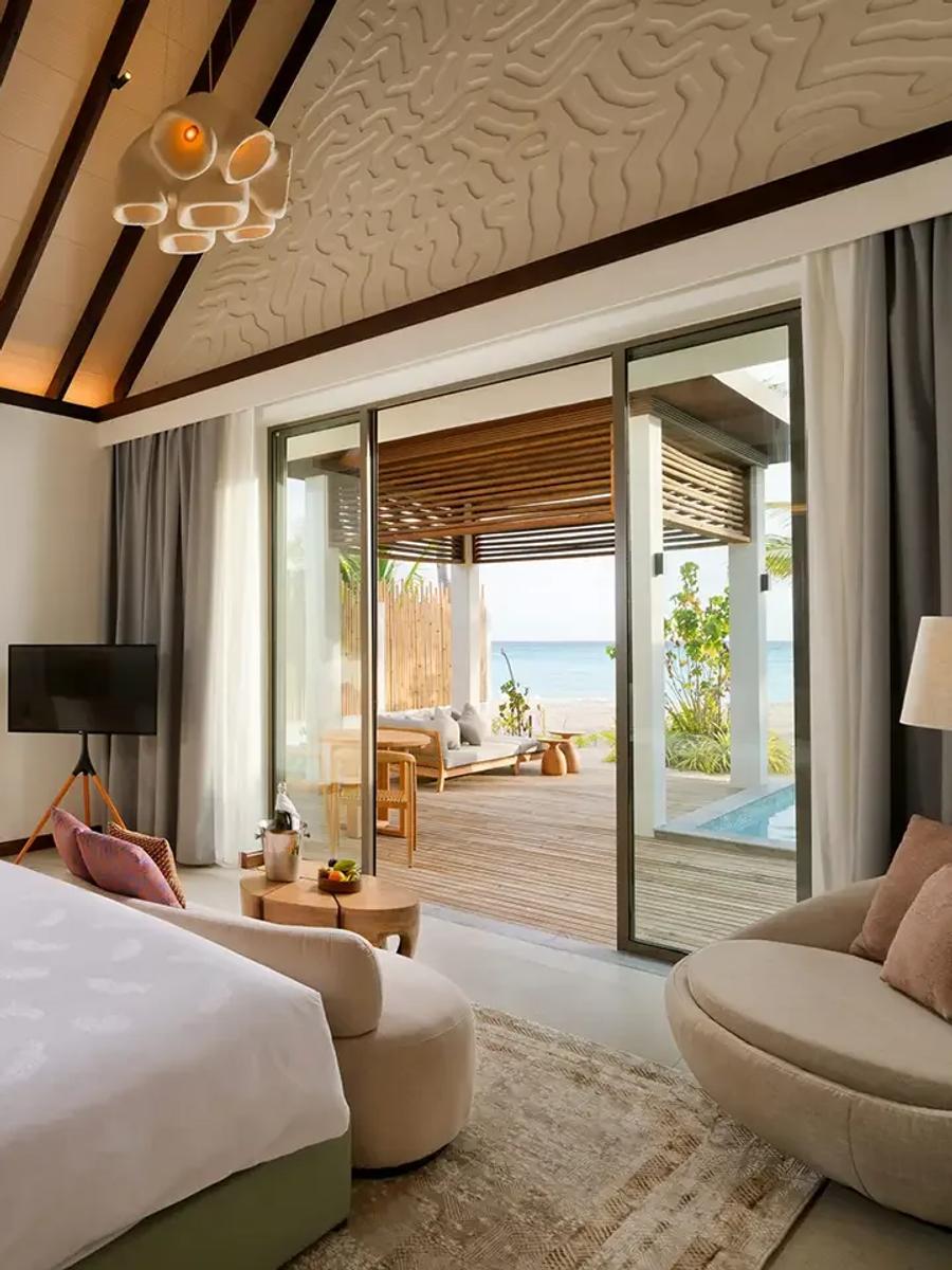 A beachfront Beach Pool Villa terrace, representative of Meyyafushi's larger Beach Suite categories