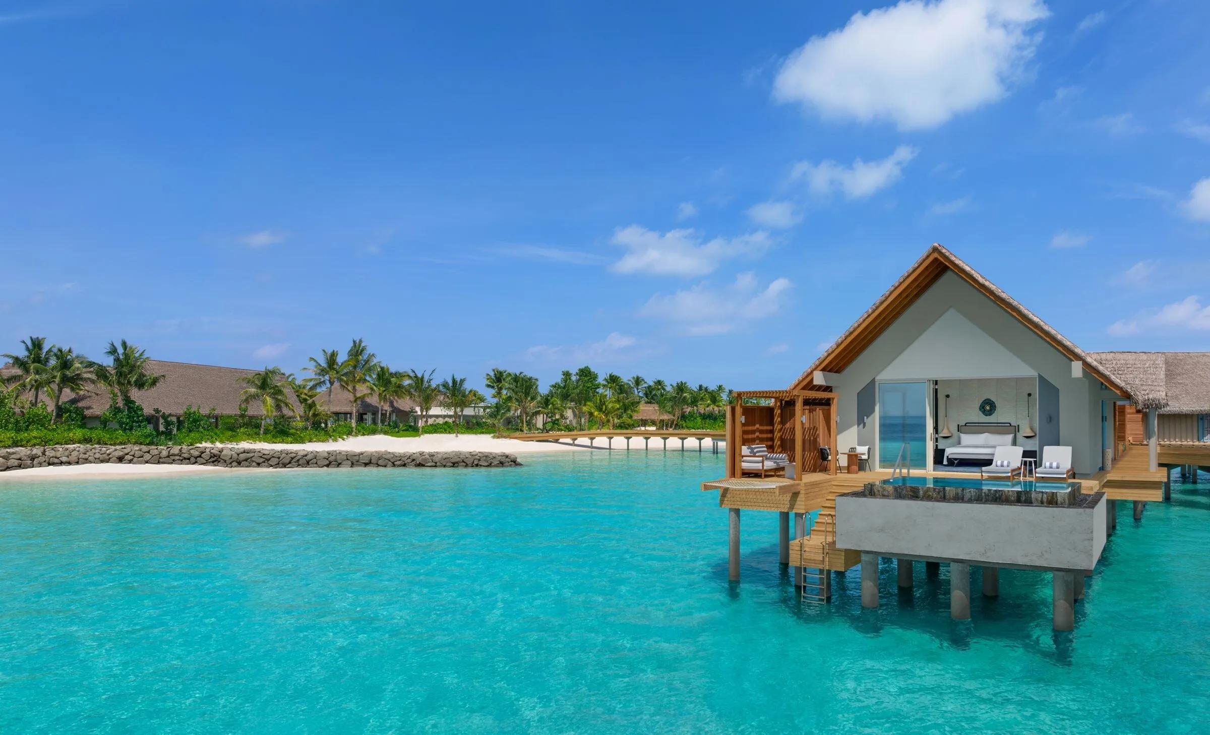 An Overwater Pool Villa's private pool and deck extending out over the lagoon