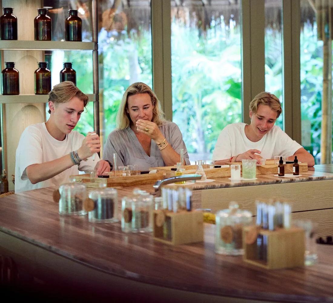 A skincare workshop underway inside AKTAR, Joali Being's herbology centre, led by the resident herbologist