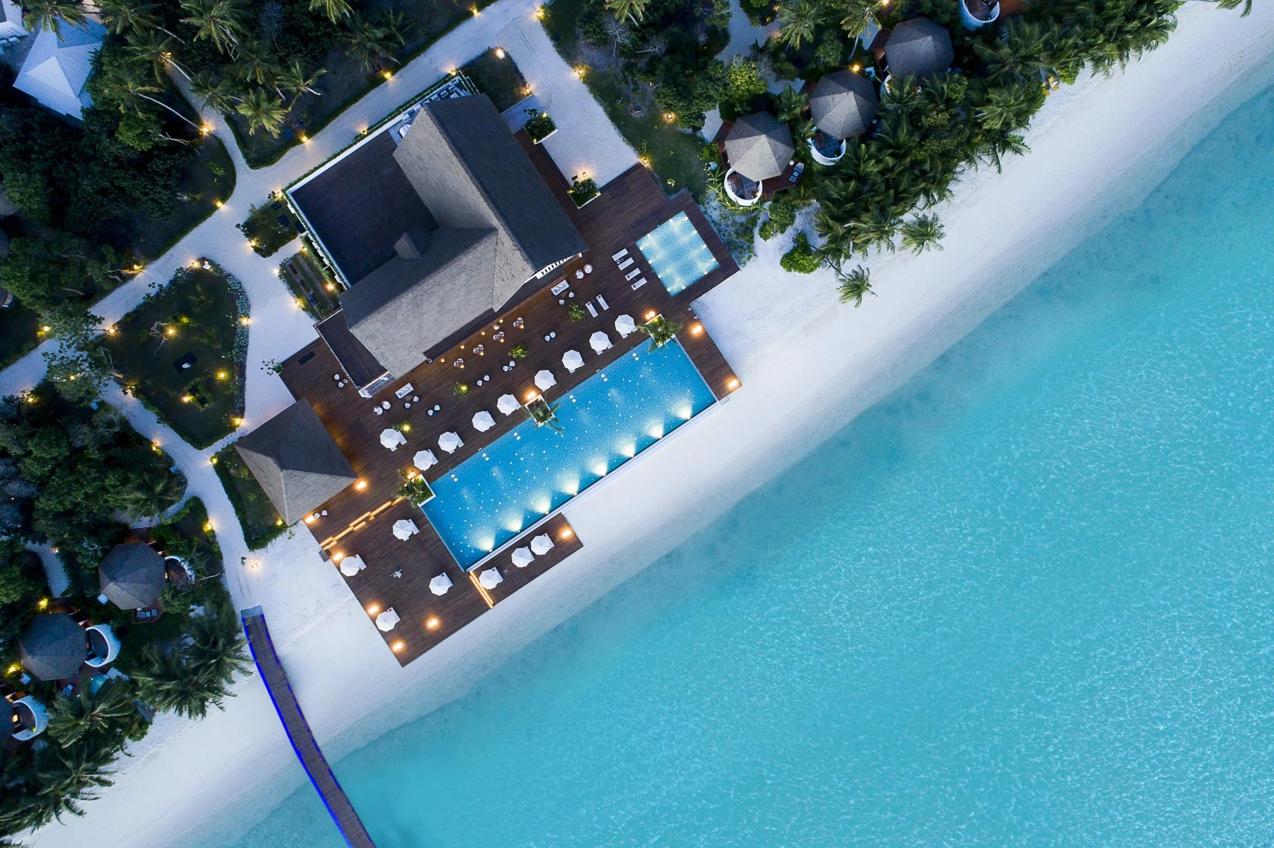 An aerial view of Alita, Mercure Maldives Kooddoo Resort's beachfront all-day restaurant
