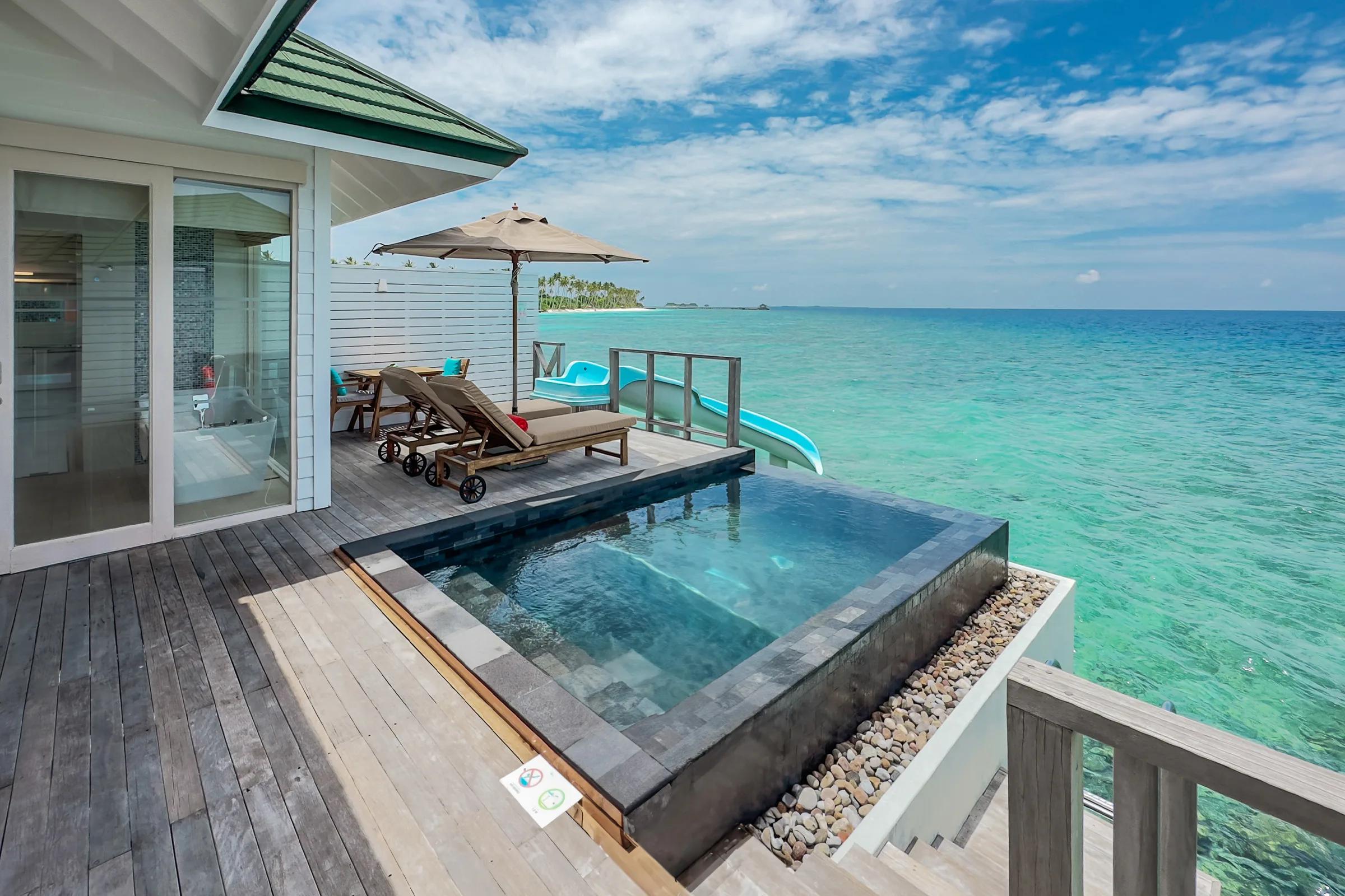 Ocean Villa with Pool and Slide's private pool over the lagoon at Siyam World