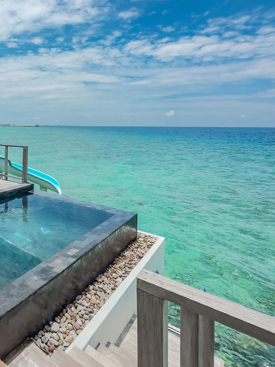 Ocean Villa with Pool and Slide's private pool over the lagoon at Siyam World
