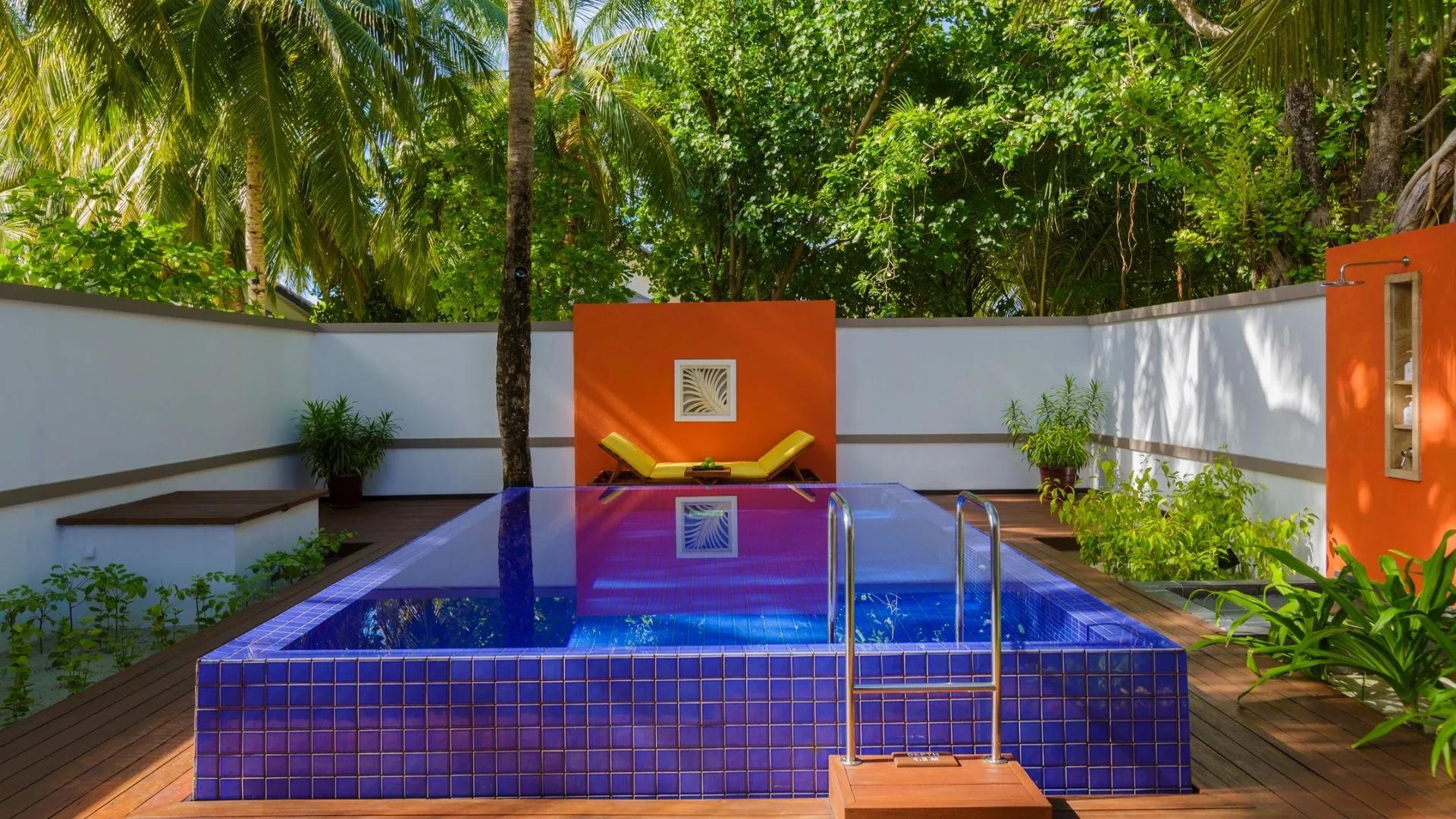 The rear-garden infinity pool and Thai sala of a Deluxe Beachfront Pool Villa at Angsana Velavaru