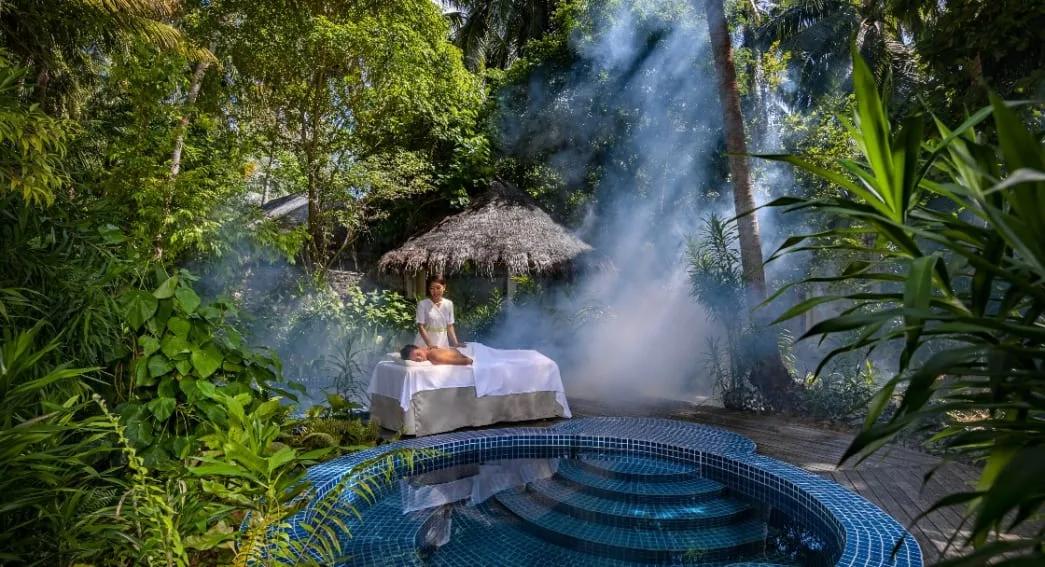 A massage set in one of Drift spa's garden sanctuaries at Niyama