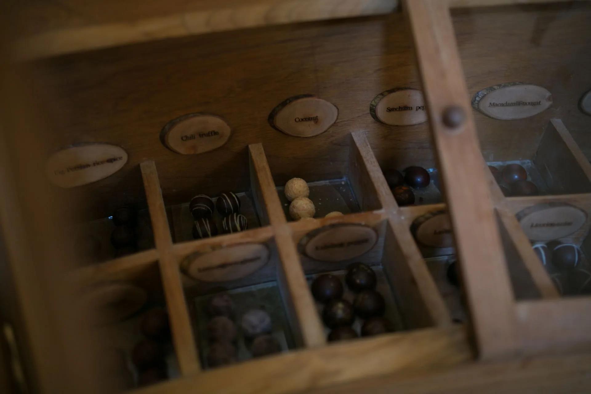 A wine and chocolate pairing set out inside Kashiveli, Gili Lankanfushi's underground wine cellar