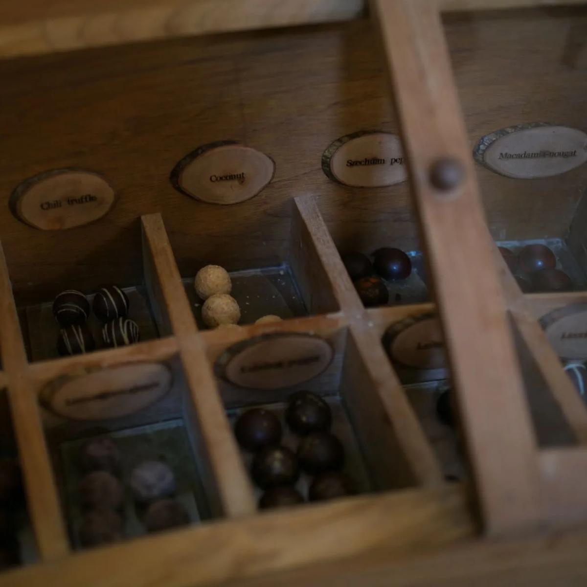 A wine and chocolate pairing set out inside Kashiveli, Gili Lankanfushi's underground wine cellar