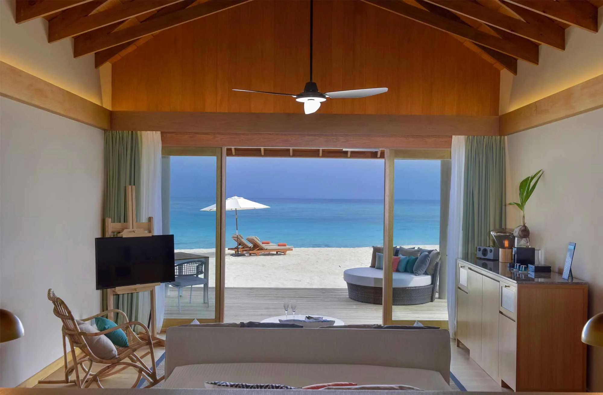 A Beach Villa's exterior and terrace, steps from the sand
