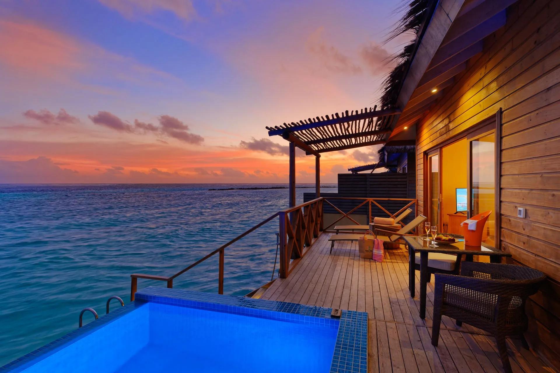 An Aqua Suite with Pool at You & Me Maldives, an overwater villa with a private pool