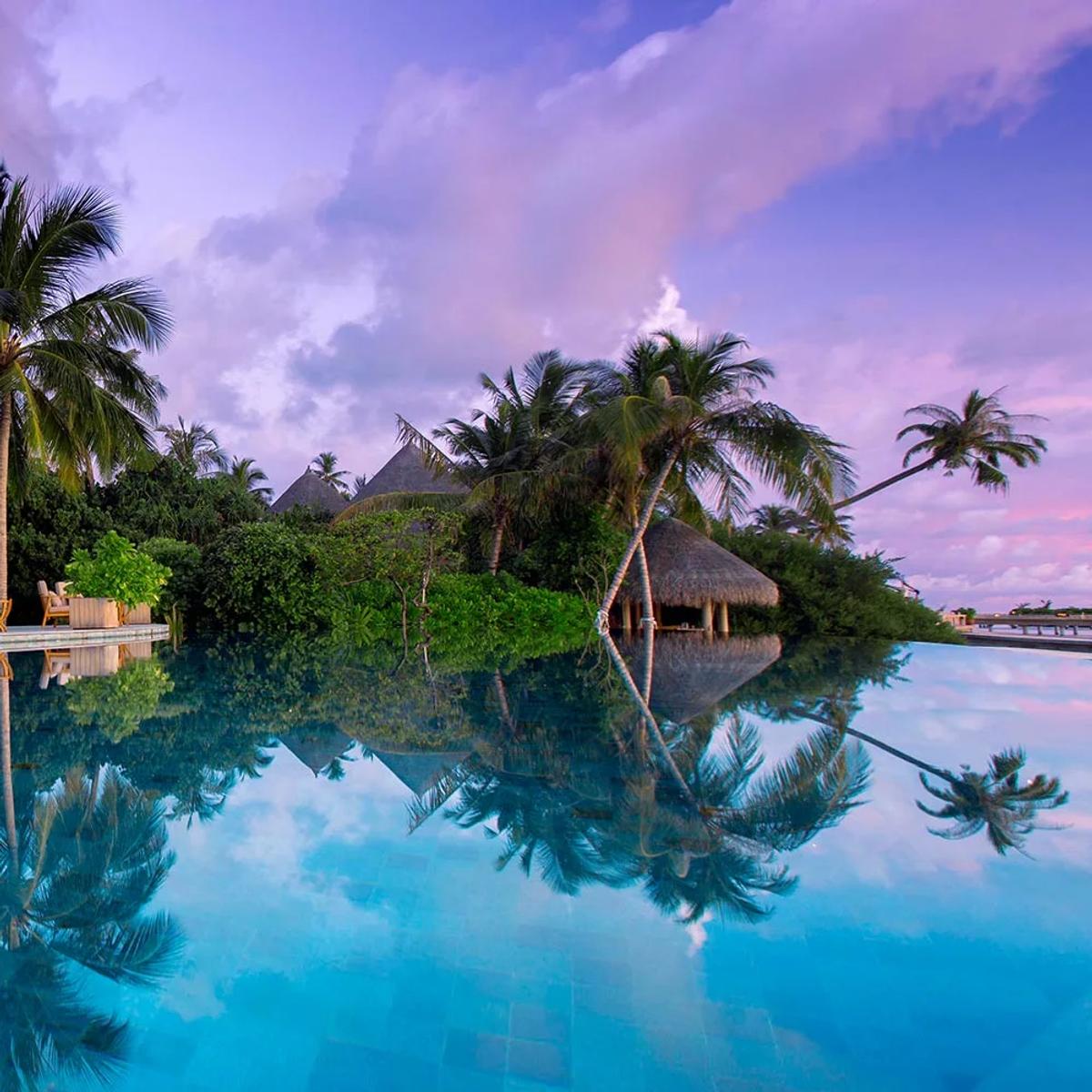 Compass Pool Bar at Milaidhoo, beside the resort's infinity pool.