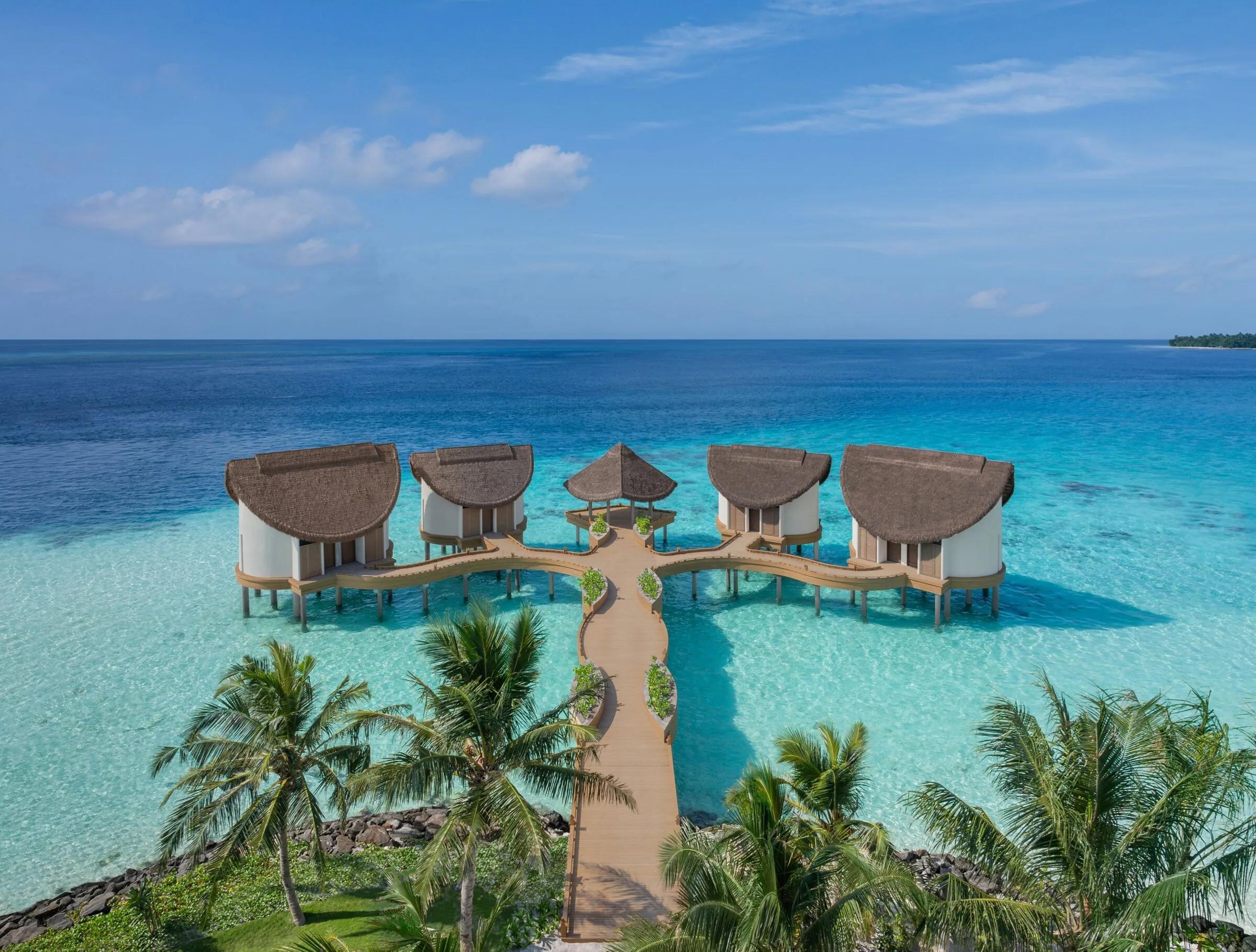 An aerial view of Spa by JW's overwater treatment pavilions