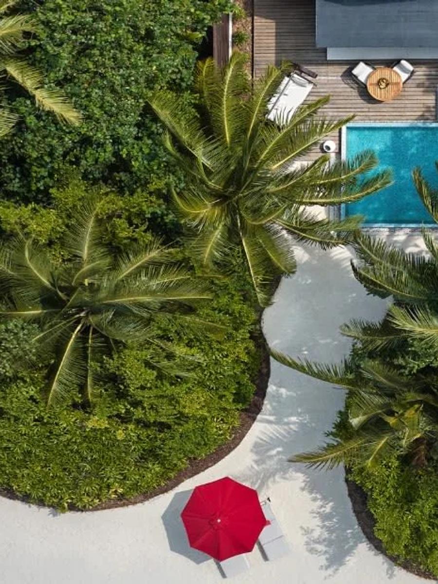 Aerial view of a Deluxe Beach Pool Villa's private pool deck at Niyama