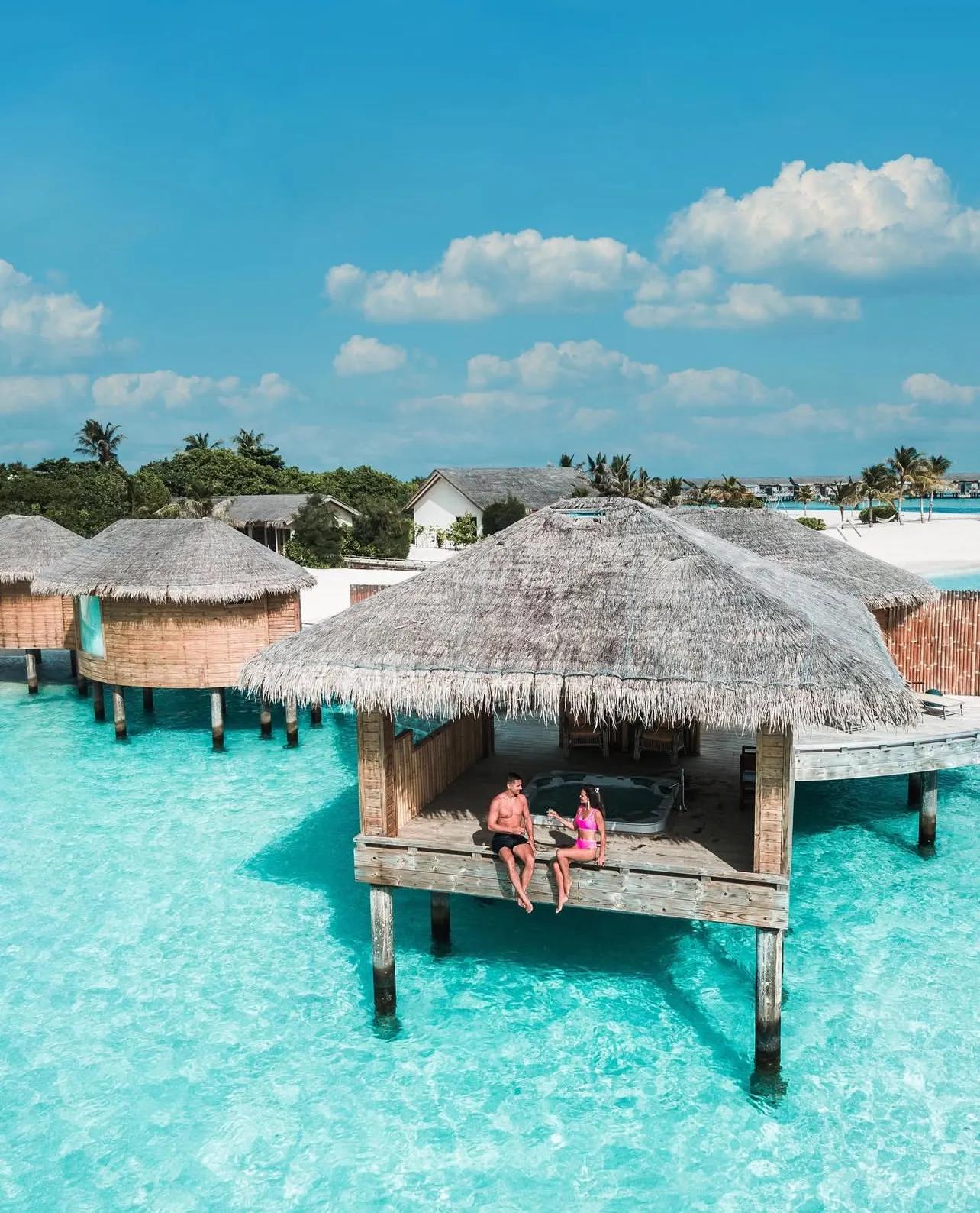 A golden-hour celebration at the water's edge in the Maldives