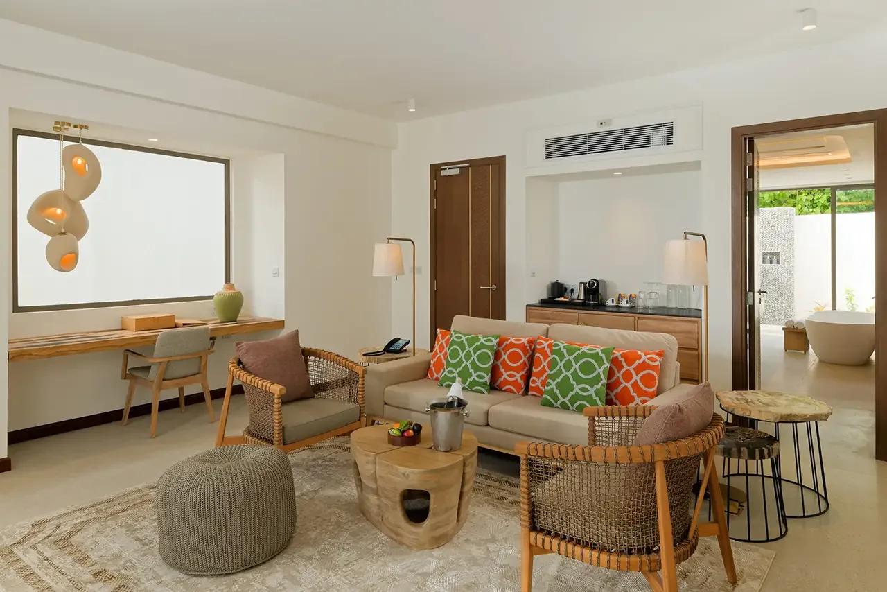 A Beach Pool Suite living area, representative of Meyyafushi's larger Beach Suite categories