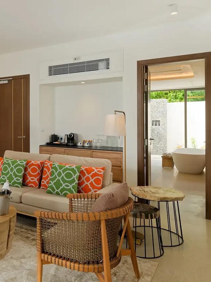 A Beach Pool Suite living area, representative of Meyyafushi's larger Beach Suite categories