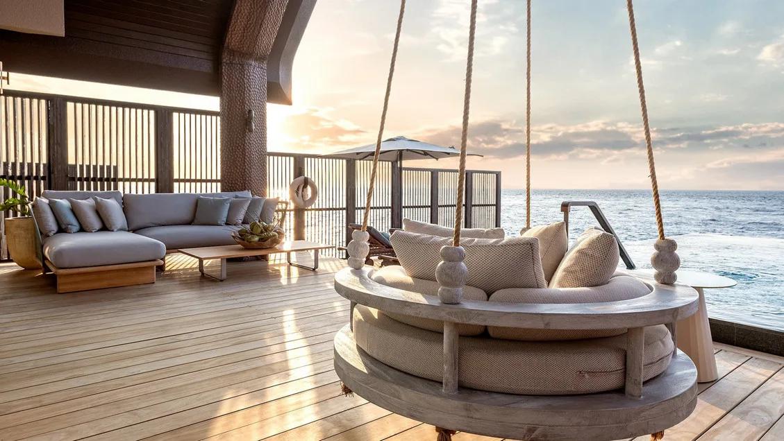 Sunset view from the terrace of a Sunset Ocean Pool Villa at Joali Being