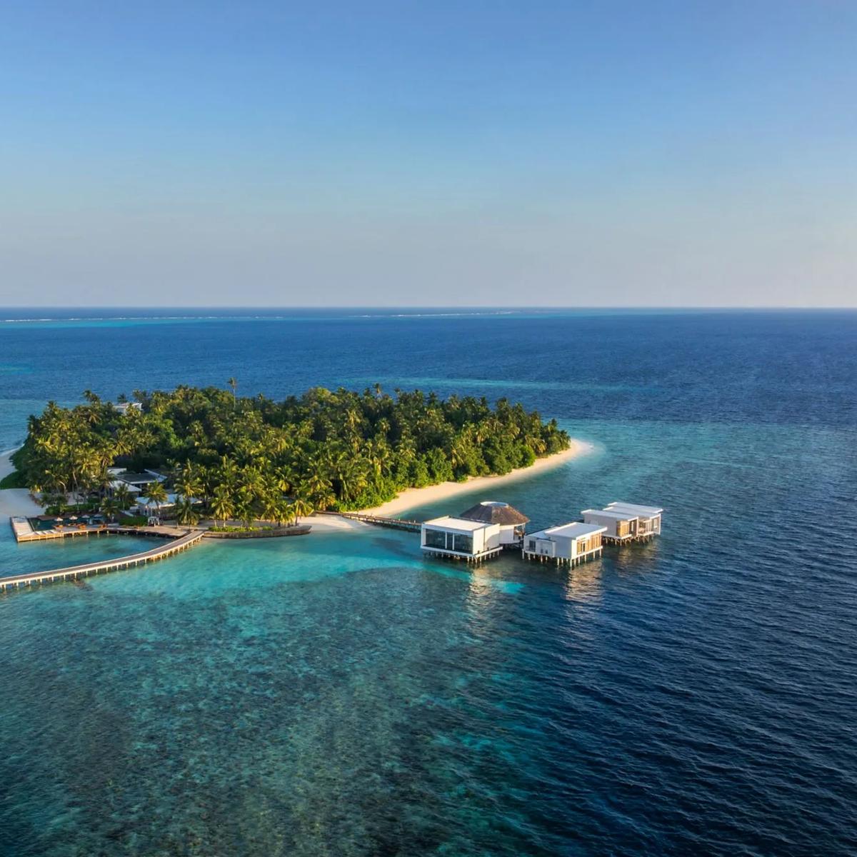 Aerial view of The Halcyon Private Isles Maldives across Gaafu Alifu Atoll's turquoise lagoon