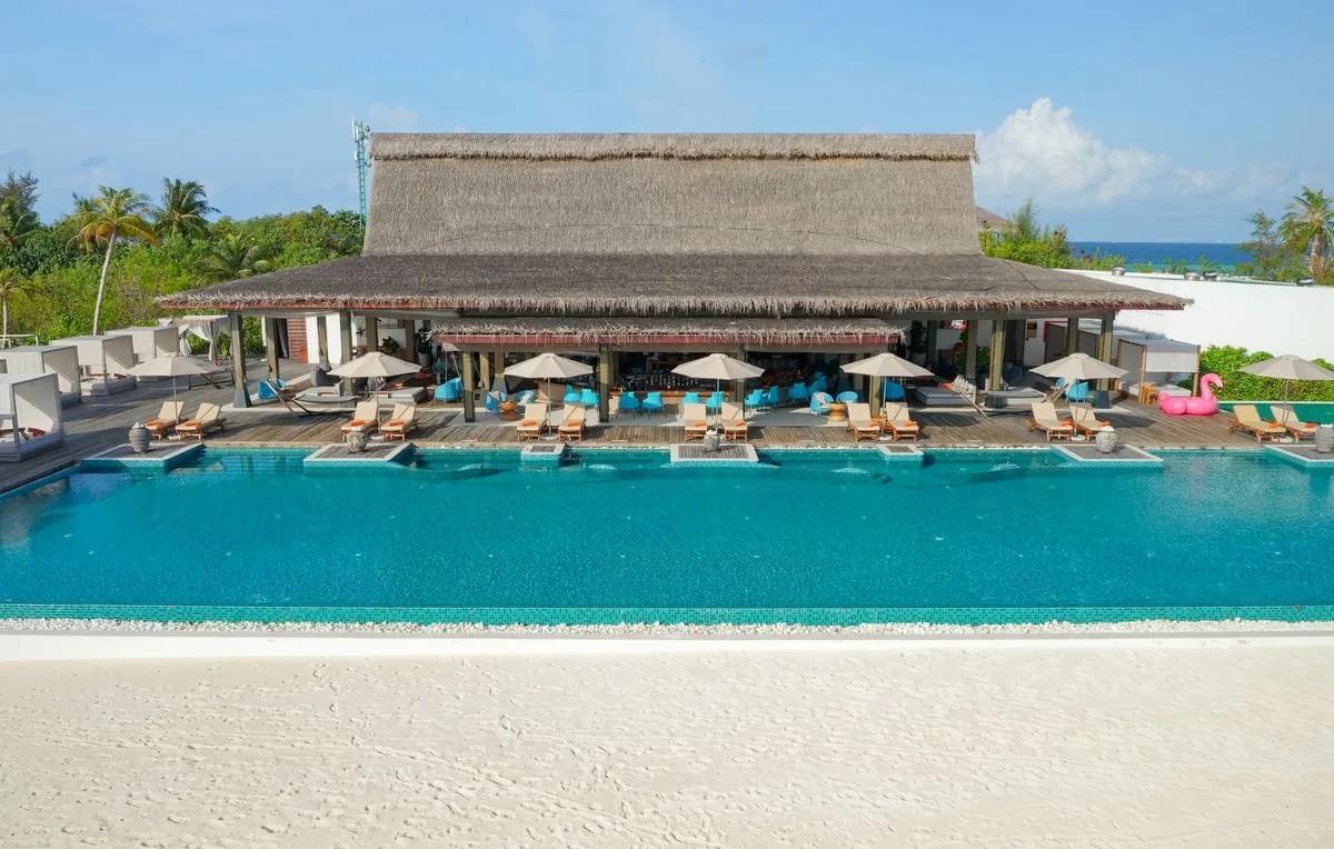 Breeze Poolside Dining & Bar beside the resort's 45-metre infinity pool