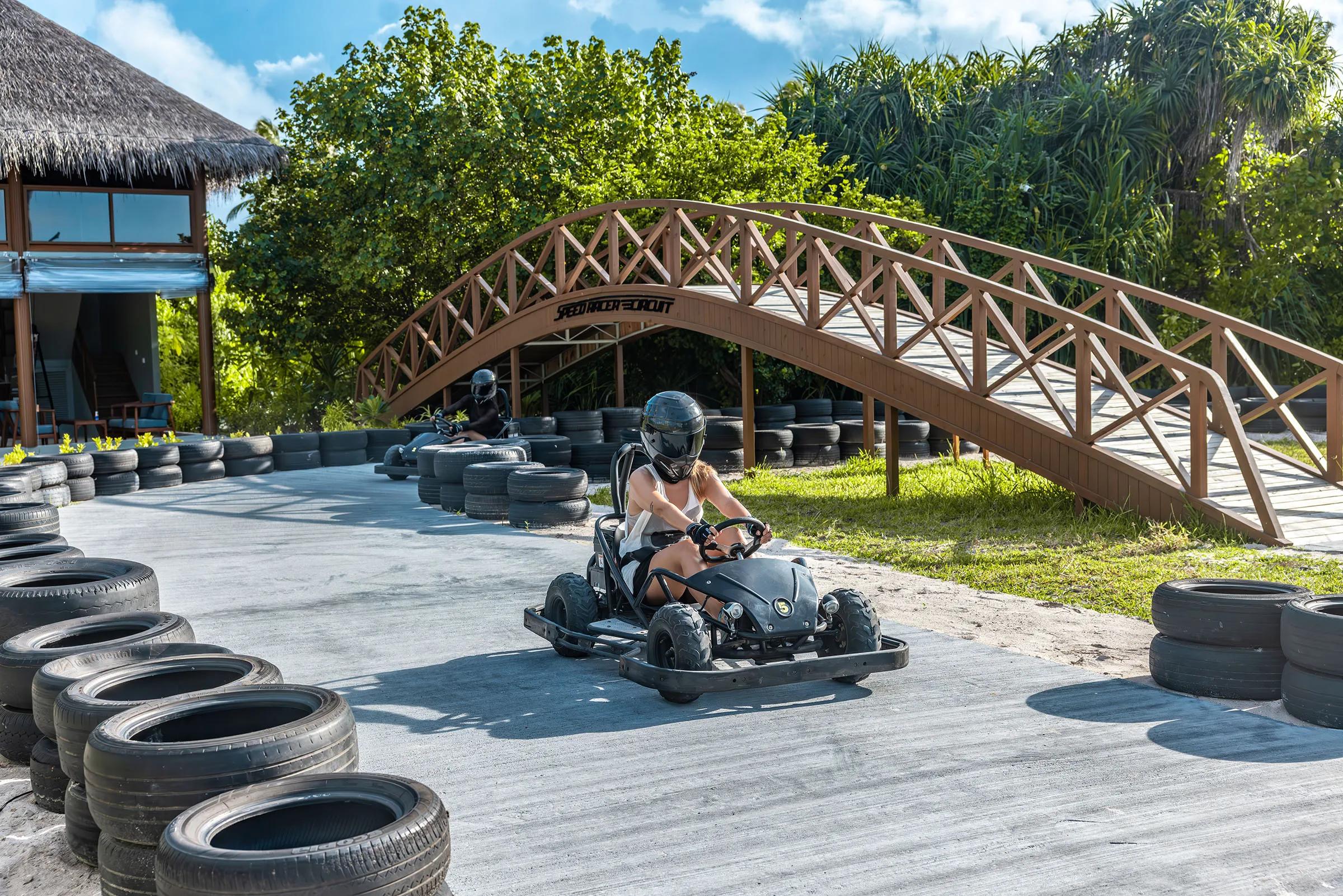 Electric go-karts on the track at Siyam World