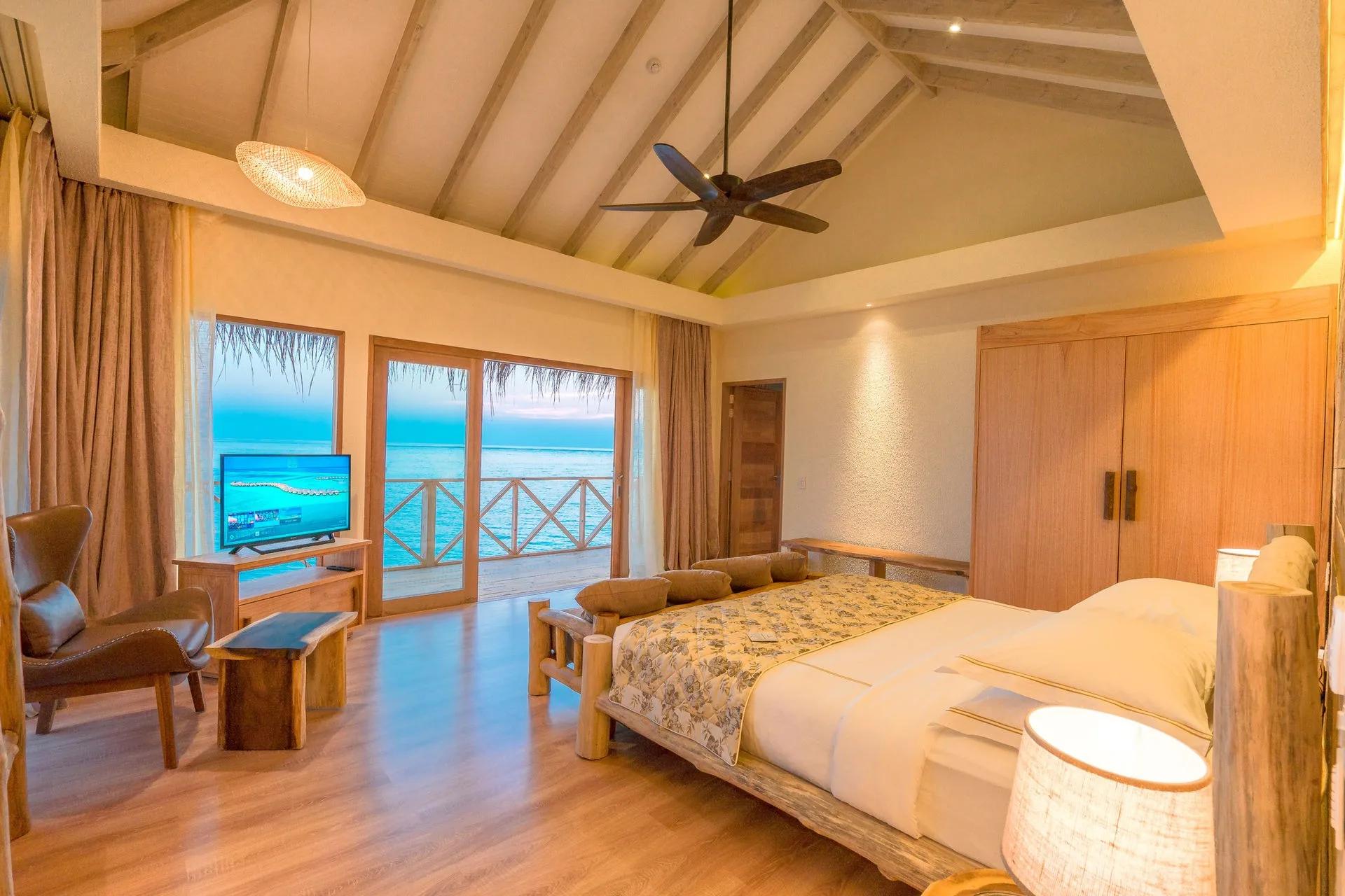 The You & Me Suite with Slide, the resort's 280 sqm signature overwater suite with its private pool and water slide