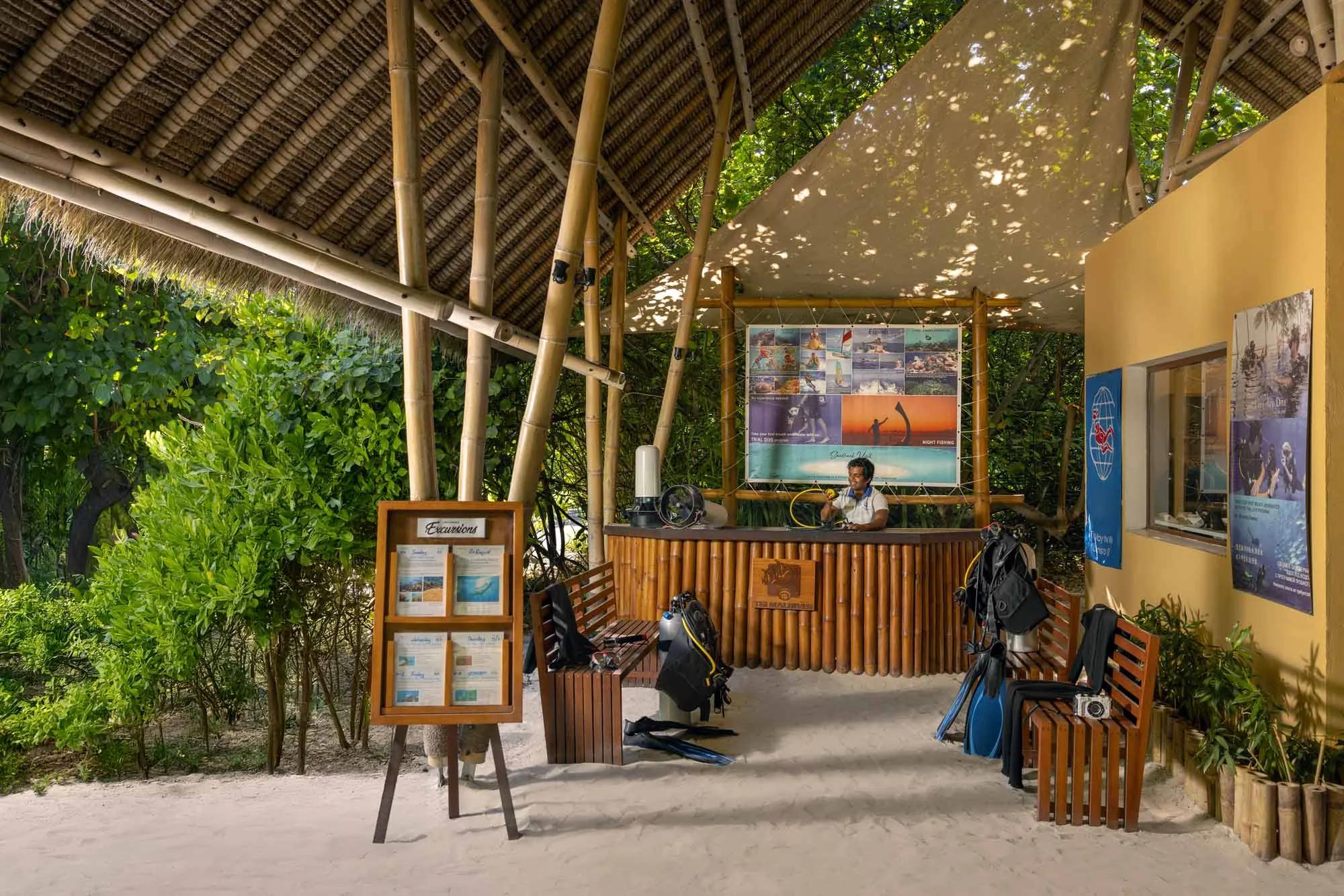Dive equipment set out at Emerald Maldives' Diving Center, ready for a reef excursion
