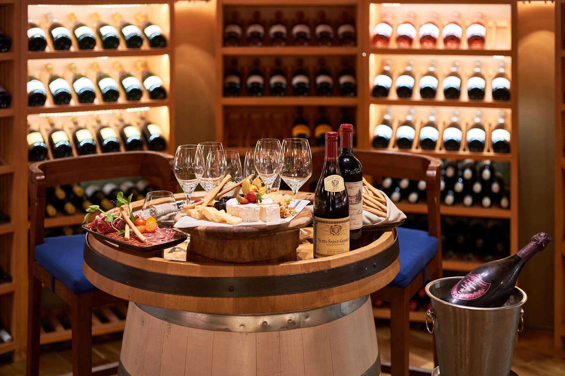 Barrique, Siyam World's private wine-cellar dining room, set for a tasting menu