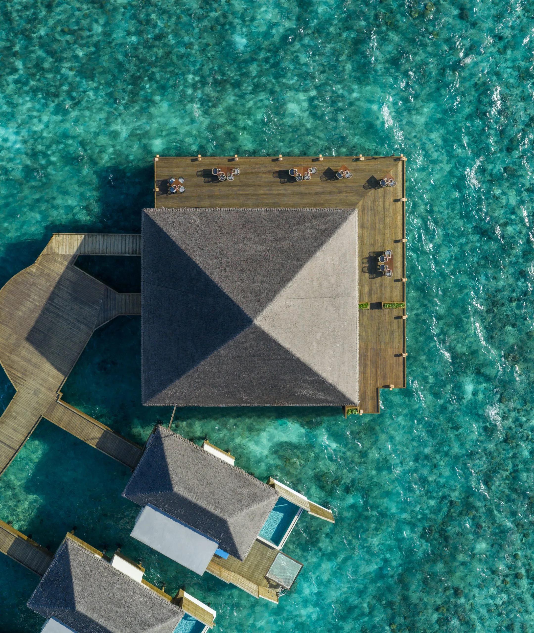 Bō's overwater dining deck at dusitD2 Feydhoo Maldives, seen from above