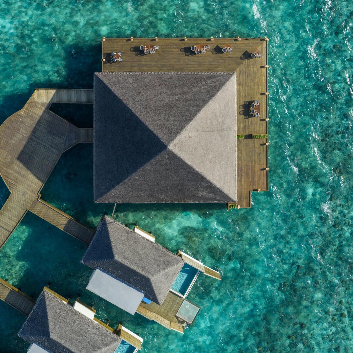 Bō's overwater dining deck at dusitD2 Feydhoo Maldives, seen from above
